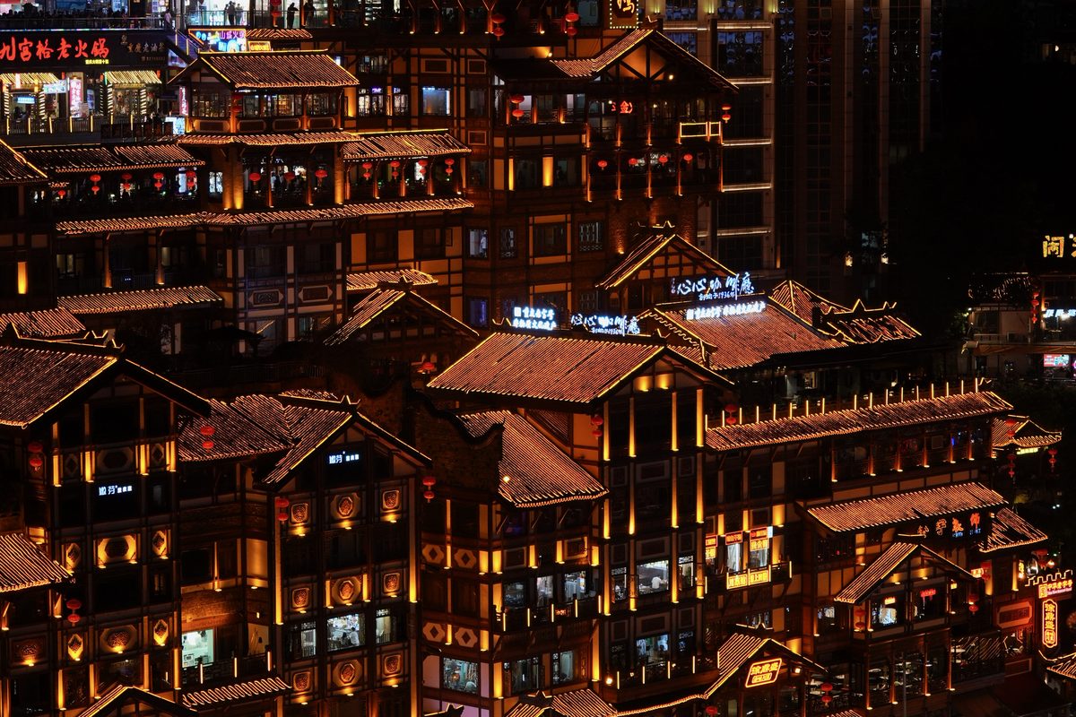 Hongyadong illuminated at night in Chongqing