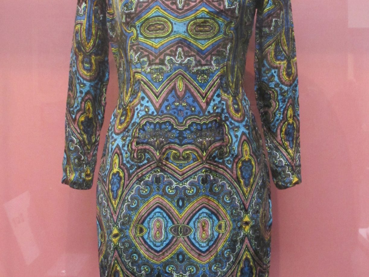 Printed velvet qipao from the 1960s-70s with a colorful geometric pattern (museum collection)